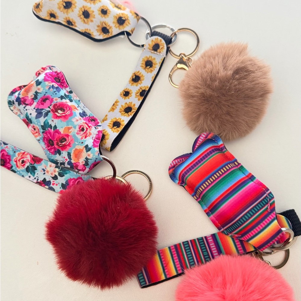 3 Keychains Floral and Striped Keychains Hand Sanitizer Holders with Pom Poms